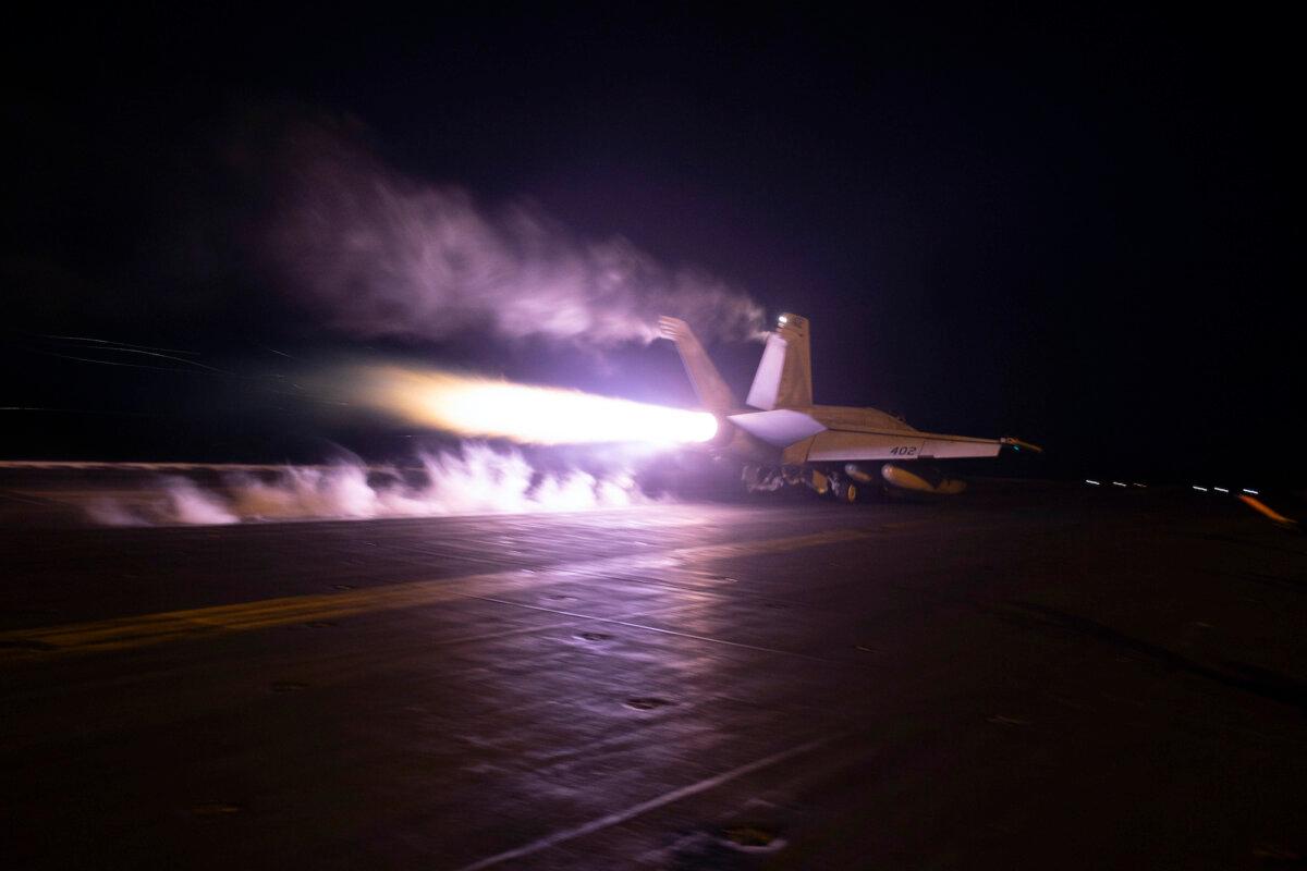 This image provided by the U.S. Navy shows an aircraft launching from USS Dwight D. Eisenhower (CVN 69) during flight operations in the Red Sea, on Jan. 22, 2024. (Kaitlin Watt/U.S. Navy via AP)