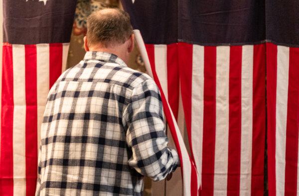 Citizens cast their votes in Dixville Notch, N.H., on Jan. 23, 2024. (John Fredricks/The Epoch Times)