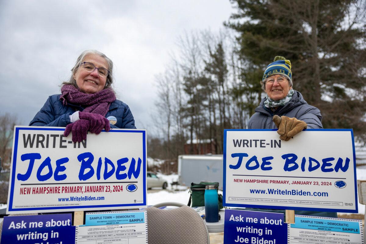Supporters of President Joe Biden greet voters on Jan. 23, 2024 in Loudon, New Hampshire. (Tasos Katopodis/Getty Images)