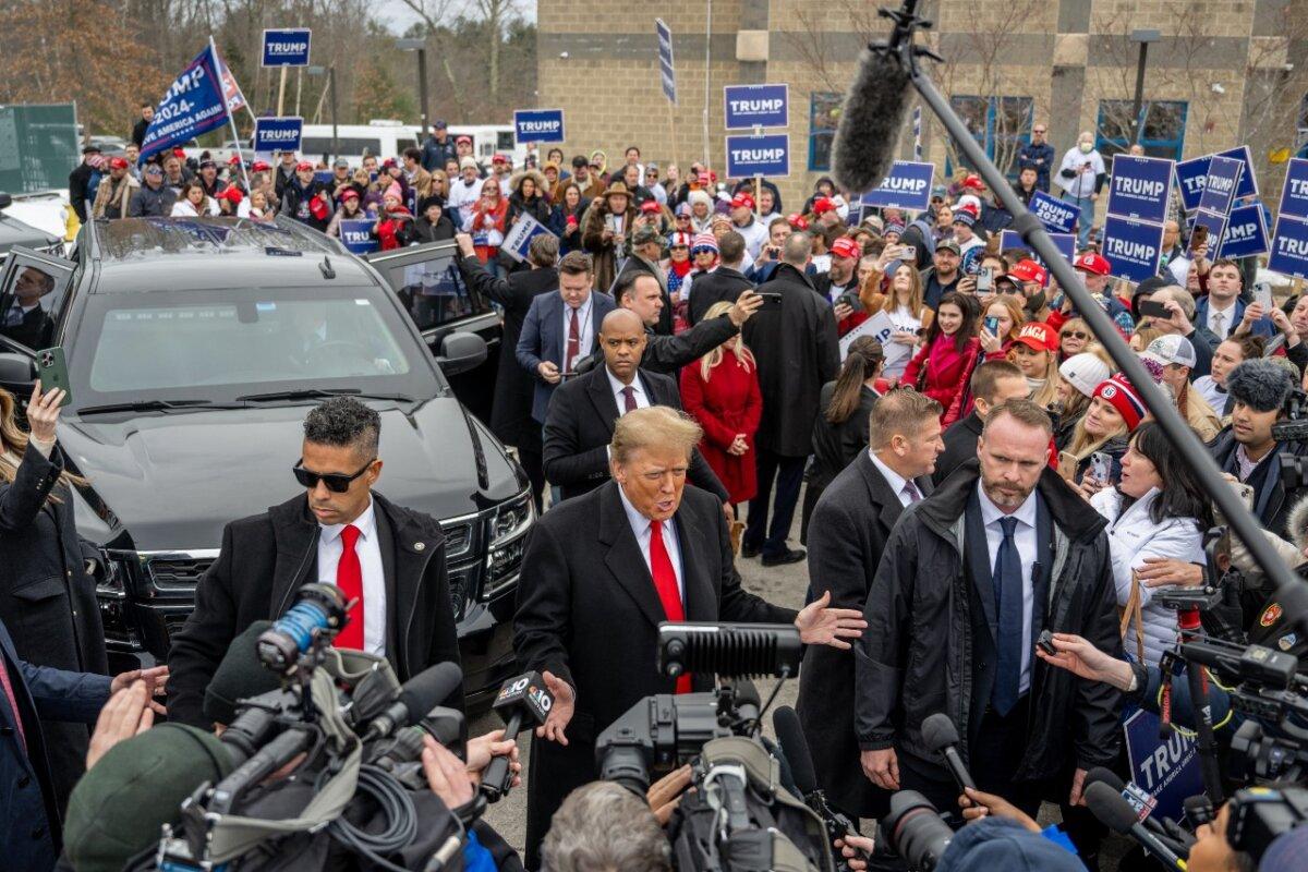 Republican presidential candidate and former President Donald Trump speaks to members of the press outside of Londonderry High School on January 23, 2024 in Londonderry, New Hampshire. (Brandon Bell/Getty Images)