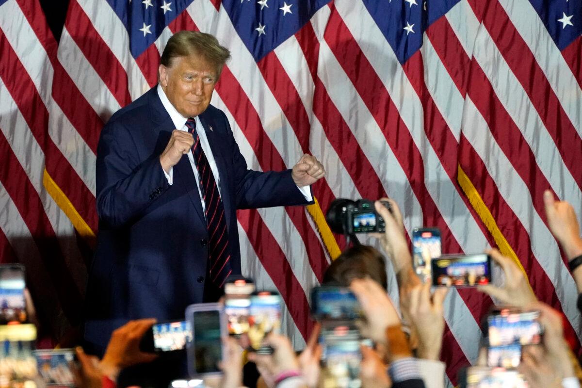 Republican presidential hopeful and former US President Donald Trump gestures during an Election Night Party in Nashua, New Hampshire, on January 23, 2024. (Timony A. Clary/AFP via Getty Images)