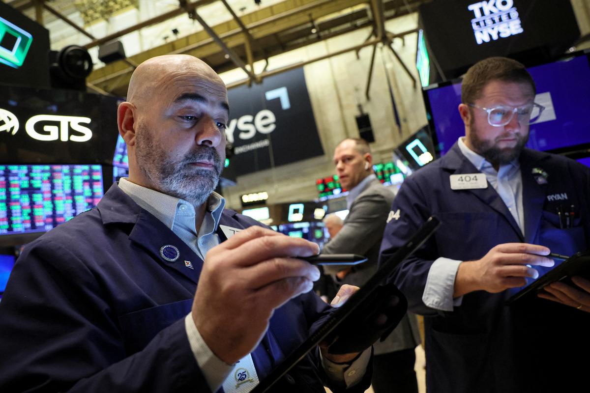 Wall Street Opens Higher After Strong GDP Data; Tesla Slides on Growth Warning