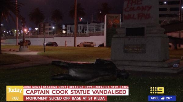 A screen grab taken on Jan. 25, 2024 shows the Captain Cook memorial statue in St Kilda on the group after it was sliced off at the ankles at around 3:30am. The incident occurred the day before Australia Day. (AAP Image/Supplied by Channel Nine)