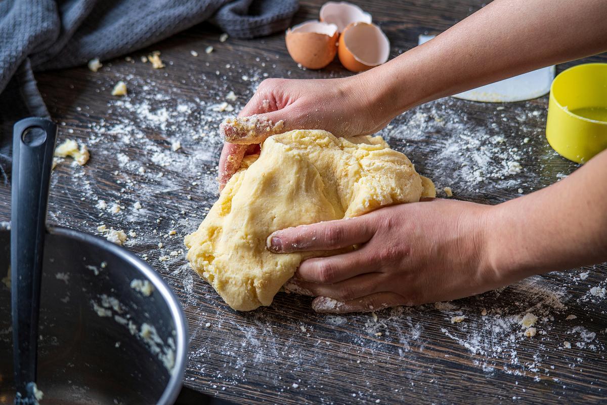 Time to get your hands dirty! Enjoy the process of mastering the dough consistency. (Unsplash)