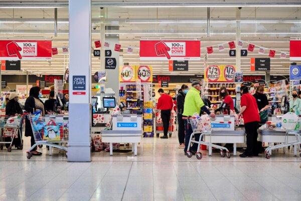 Residents shop at a supermarket in Canberra, Australia, on August 12, 2021. (Rohan Thomson/AFP via Getty Images)