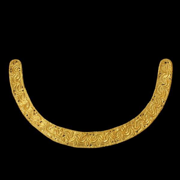 A view of a repousse gold ornament, U-shaped for attachment to furniture or clothing originating from Ghana, in London on Jan. 25, 2024. (Victoria and Albert Museum, London via AP)