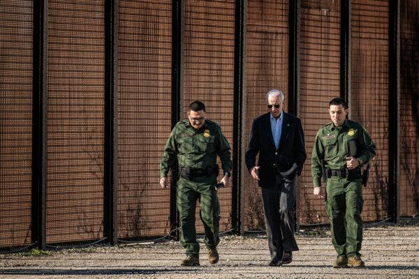 President Joe Biden speaks with U.S. Customs and Border Protection officers as he visits the U.S.-Mexico border in El Paso, Texas, on Jan. 8, 2023. (Jim Watson/AFP via Getty Images)