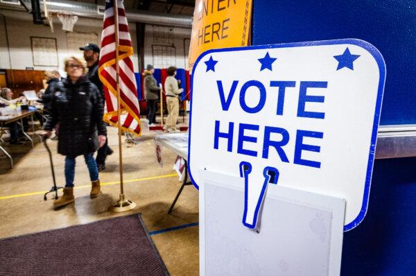 Voters cast their ballots in Portsmouth, N.H., on Jan. 23, 2024. (John Fredricks/The Epoch Times)
