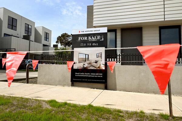 A worker living in Greater Melbourne and earning an average $85,000 per year, would spend the equivalent of six months’ income on stamp duty purchasing a typical home. (William West/AFP via Getty Images)