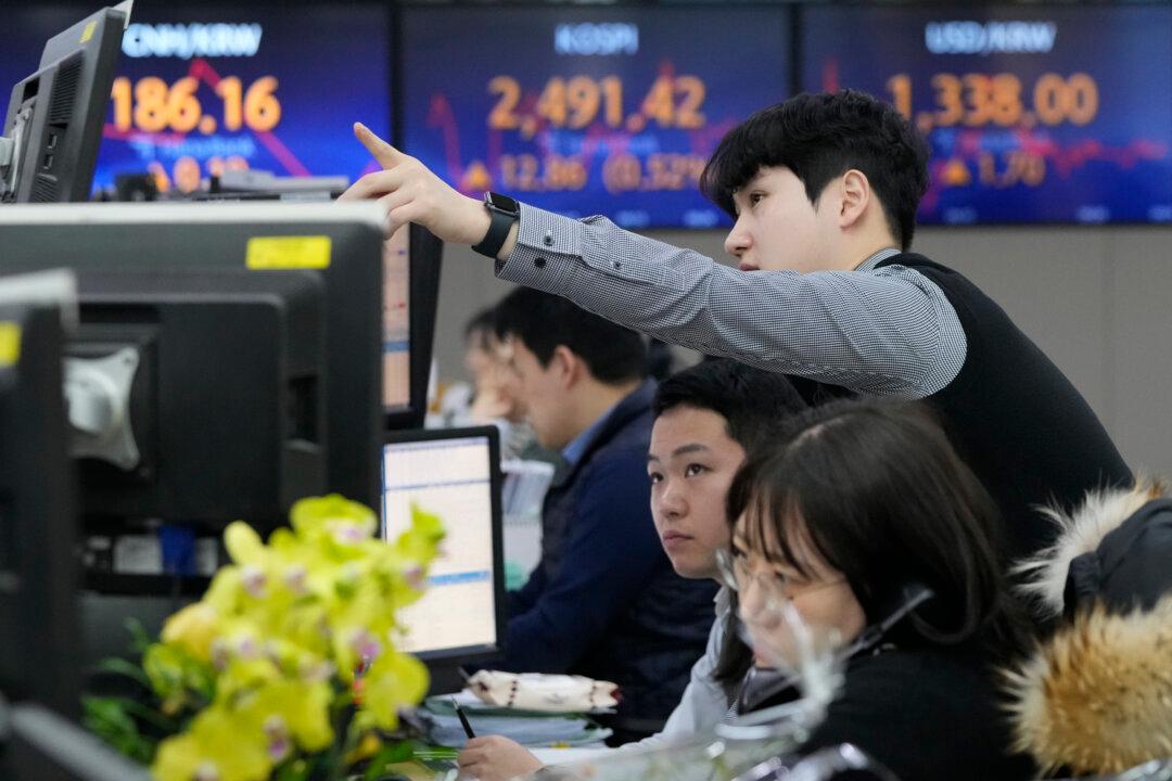 World Shares Mixed Ahead of Eventful Week; China Evergrande to Be Liquidated