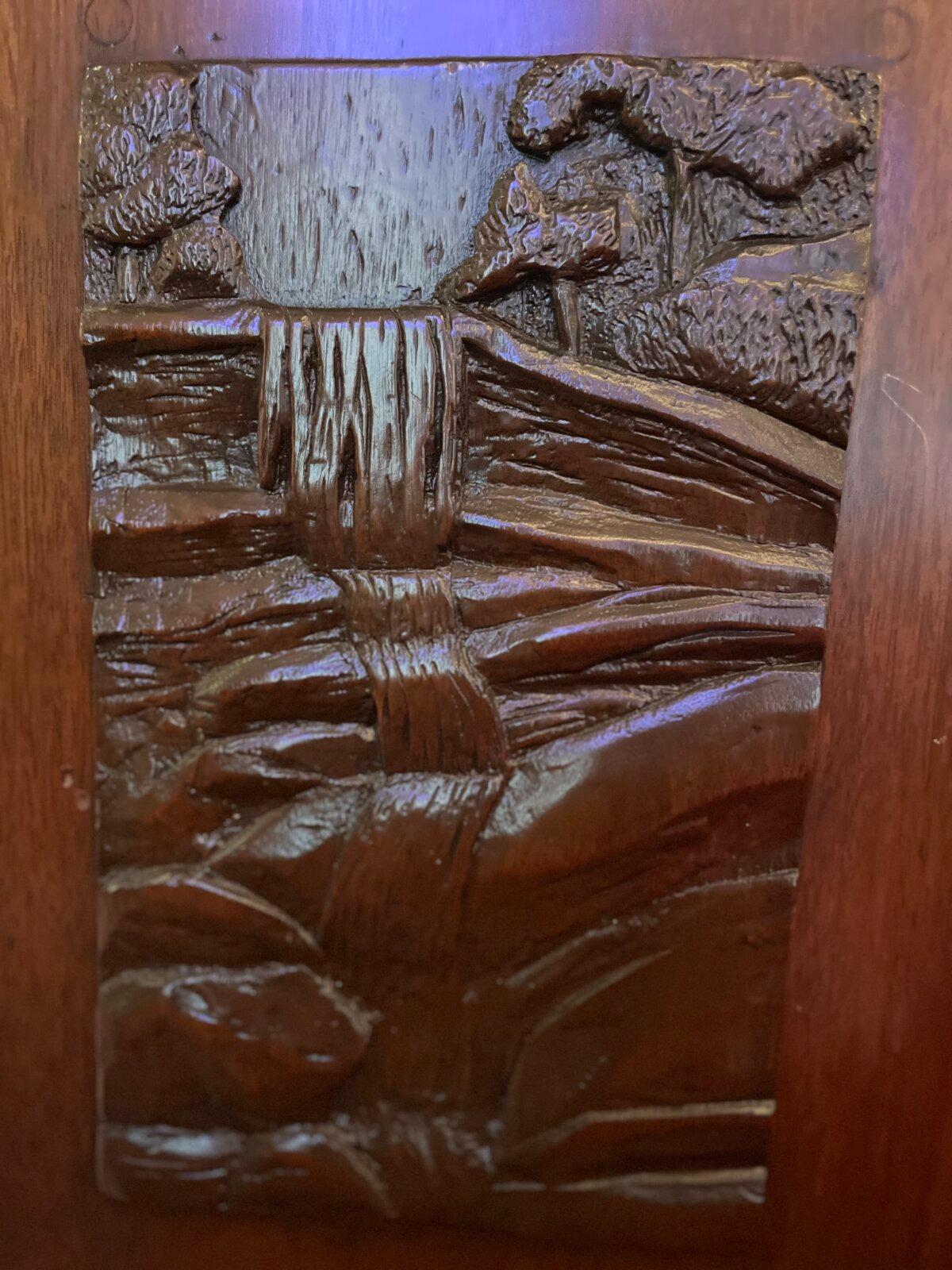 The carving of Highlands Falls on the pulpit in First Presbyterian Church of Highlands. (Courtesy of Deena Bouknight)