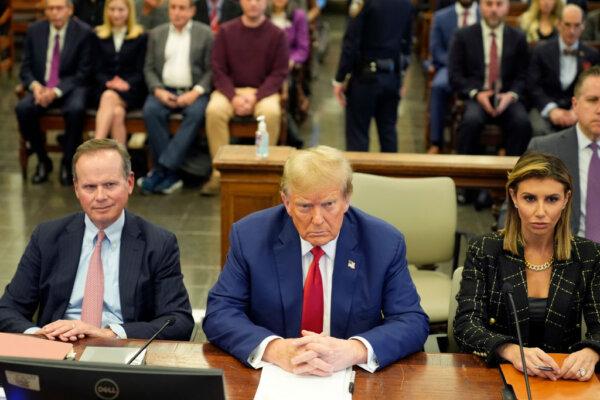Former U.S. President Donald Trump and his lawyers Christopher Kise (L) and Alina Habba attend the closing arguments in the Trump Organization civil fraud trial at New York State Supreme Court in New York City on Jan. 11, 2024. (Seth Wenig-Pool/Getty Images)