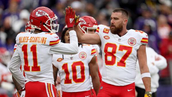 Travis Kelce #87 and Marquez Valdes-Scantling #11 of the Kansas City Chiefs warm up at M&T Bank Stadium in Baltimore, Md., on Jan. 28, 2024. (Photo by Rob Carr/Getty Images)