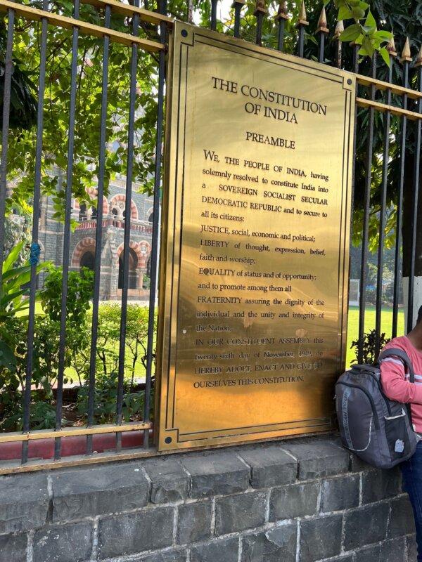 The preamble of India’s constitution on a sign in Mumbai. (Courtesy of Loretta Breuning)