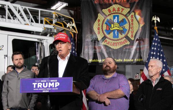 Sen. J.D. Vance (R-Ohio)(L) looks on as former President Donald Trump speaks at the East Palestine Fire Department in East Palestine, Ohio, on Feb. 22, 2023. (Rebecca Droke/AFP via Getty Images)