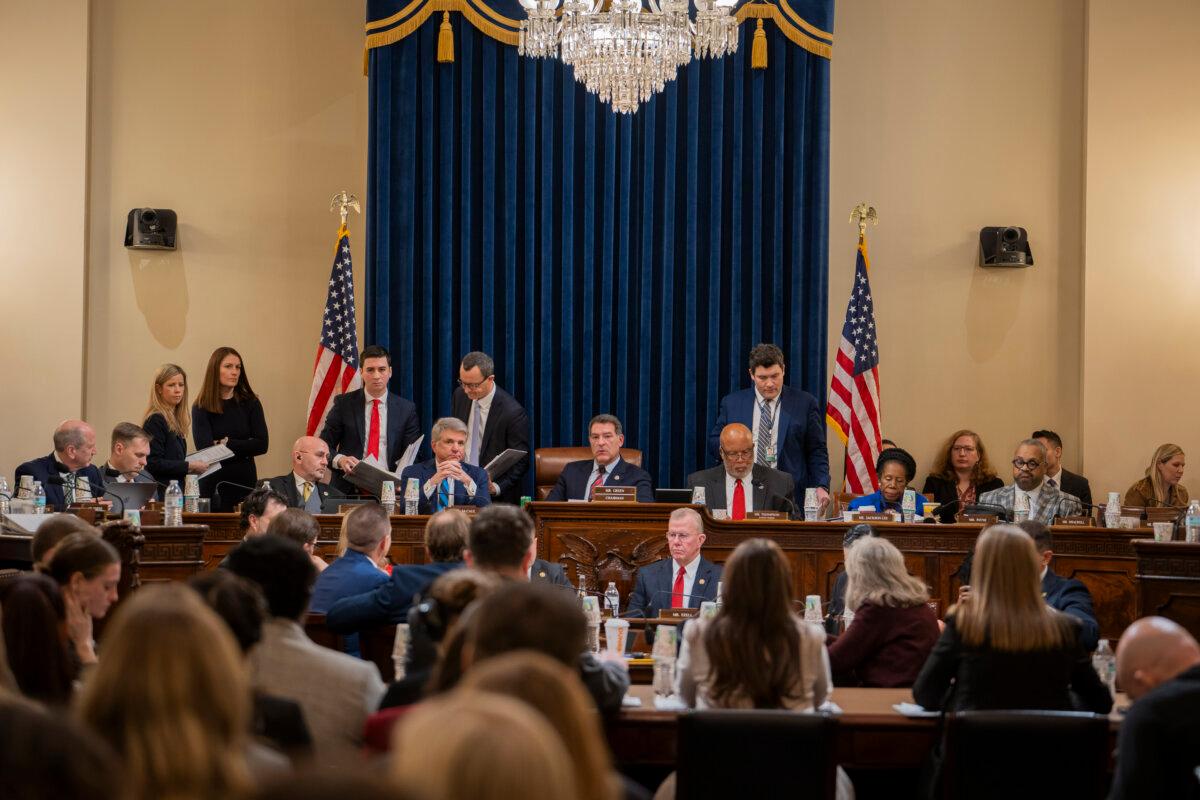 (L-R) Rep. Michael McCaul (R-Texas), Chairman of the House Committee on Homeland Security Rep. Mark Green (R-Tenn.), and Ranking Member Rep. Bennie Thompson (D-Miss.) meet with other lawmakers to mark up articles of impeachment against Secretary of the Department of Homeland Security (DHS) Alejandro N. Mayorkas in Washington on Jan. 30, 2024. (Madalina Vasiliu/The Epoch Times)