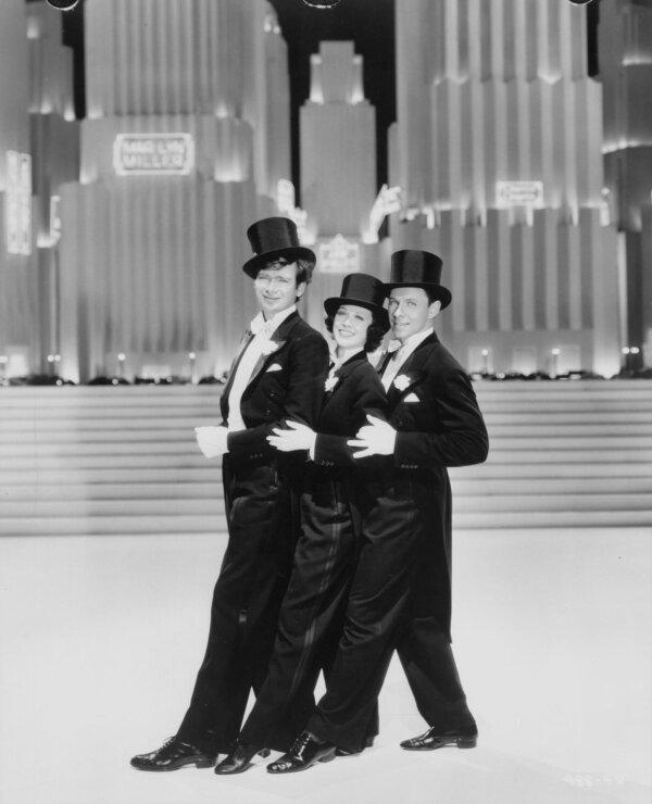 (L–R) Buddy Ebsen, Eleanor Powell, and George Murphy, in “Broadway Melody of 1938.” (MovieStillsDB)