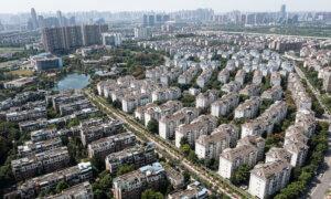 China’s Plunging Housing Market Is Only Halfway to Bottom, Analysts Say