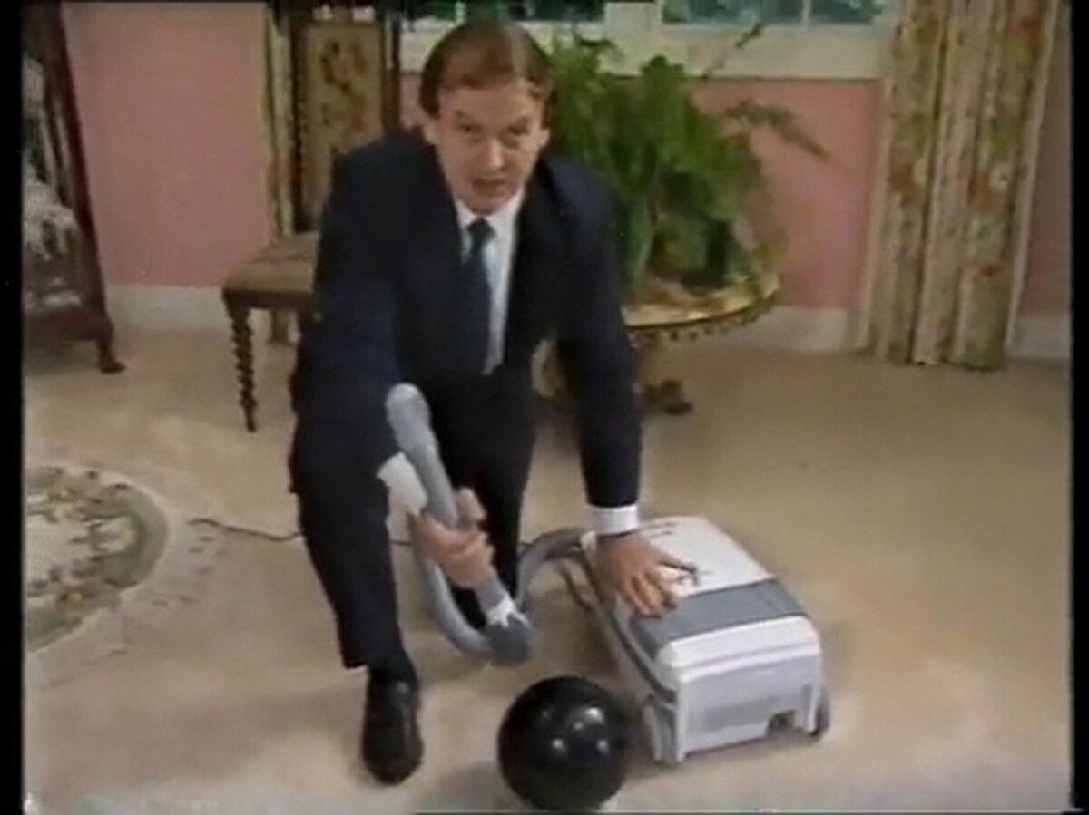 A still from a video advertisement obtained July 6, 2016, of former Godfrey's boss John Hardy in a 1990 TV ad for the vacuum cleaner retailer. (AAP Image/YouTube)