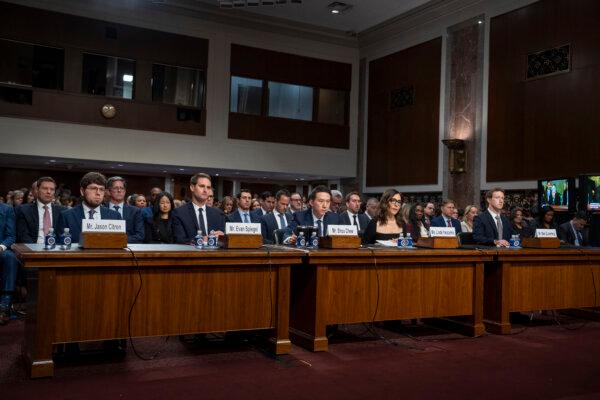 (L-R) Discord CEO Jason Citron, Snap Co-founder and CEO Evan Spiegel, TikTok CEO Shou Chew, X, previously known as Twitter, CEO Linda Yaccarino, and Meta Founder and CEO Mark Zuckerberg testify before the Senate Judiciary Committee about big tech and the online child sexual exploitation crisis in Washington on Jan. 31, 2024. (Madalina Vasiliu/The Epoch Times)