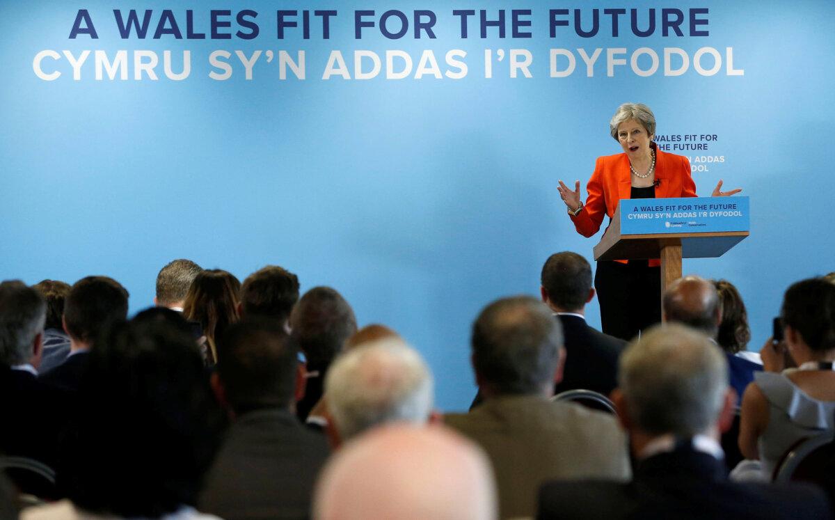 UK Prime Minister Theresa May speaks at the Welsh Conservative Party conference at Ffos Las Racecourse in Kidwelly, Llanelli, Wales, on May 18, 2018. (Andrew Yates - WPA Pool/Getty Images)