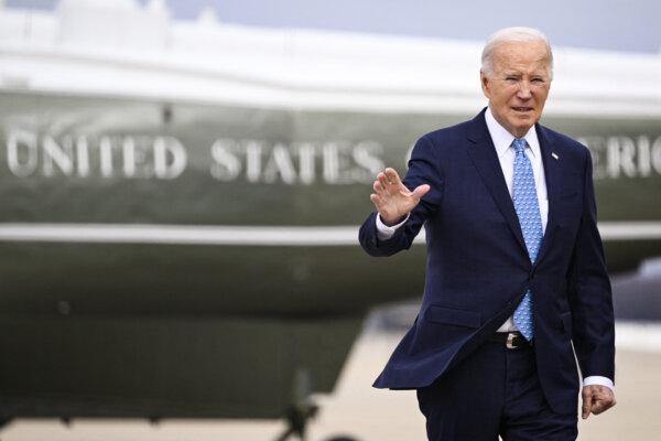 President Joe Biden answers questions while departing the White House in Washington on Jan. 30, 2024. (Win McNamee/Getty Images)