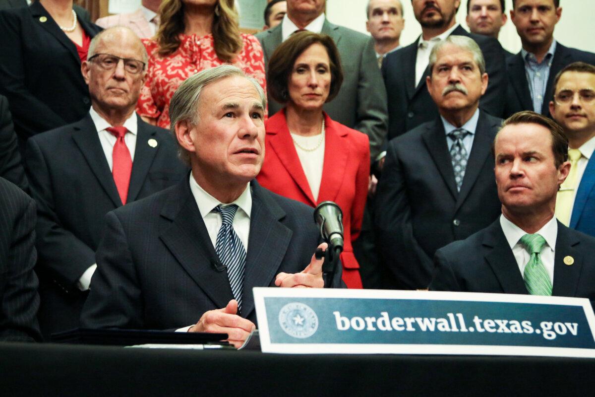 Texas Gov. Greg Abbott (C) speaks at a press conference at the state capitol in Austin, Texas, on June 16, 2021. (Mei Zhong/The Epoch Times)
