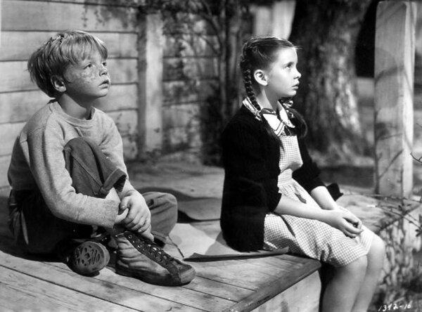 Arnold Hanson (Jackie "Butch" Jenkins) and Selma Jacobson (Margaret O’Brien), in “Our Vines Have Tender Grapes.” (Loew's Inc.)