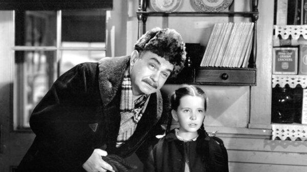 Martinius Jacobson (Edward G. Robinson) and Selma Jacobson (Margaret O’Brien), in “Our Vines Have Tender Grapes.” (Loew's Inc.)