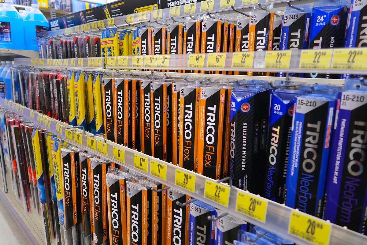 Most auto parts stores and big box retailers offer a wide selection of replacement windshield wiper blades, with a handy guide to ensure the right fit. (Red Herring/Shutterstock)