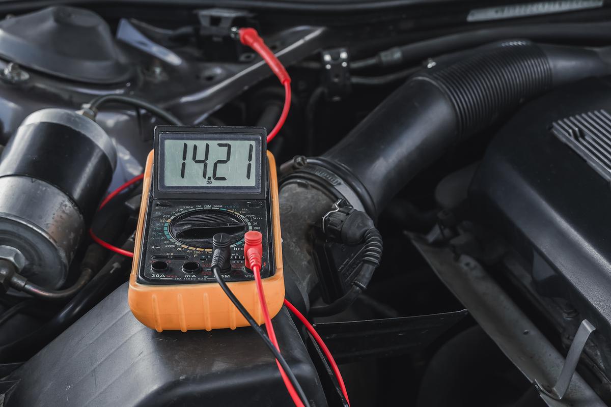 Use a multimeter to periodically test the car's battery voltage, or test when the car is hard to start; this is the ideal way to determine if the battery needs to be replaced. (ERIK Miheyeu/Shutterstock)