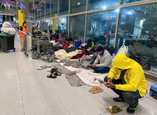 This undated photo shows some of the people housed at Boston Logan International Airport. (Alice Giordano/The Epoch Times)