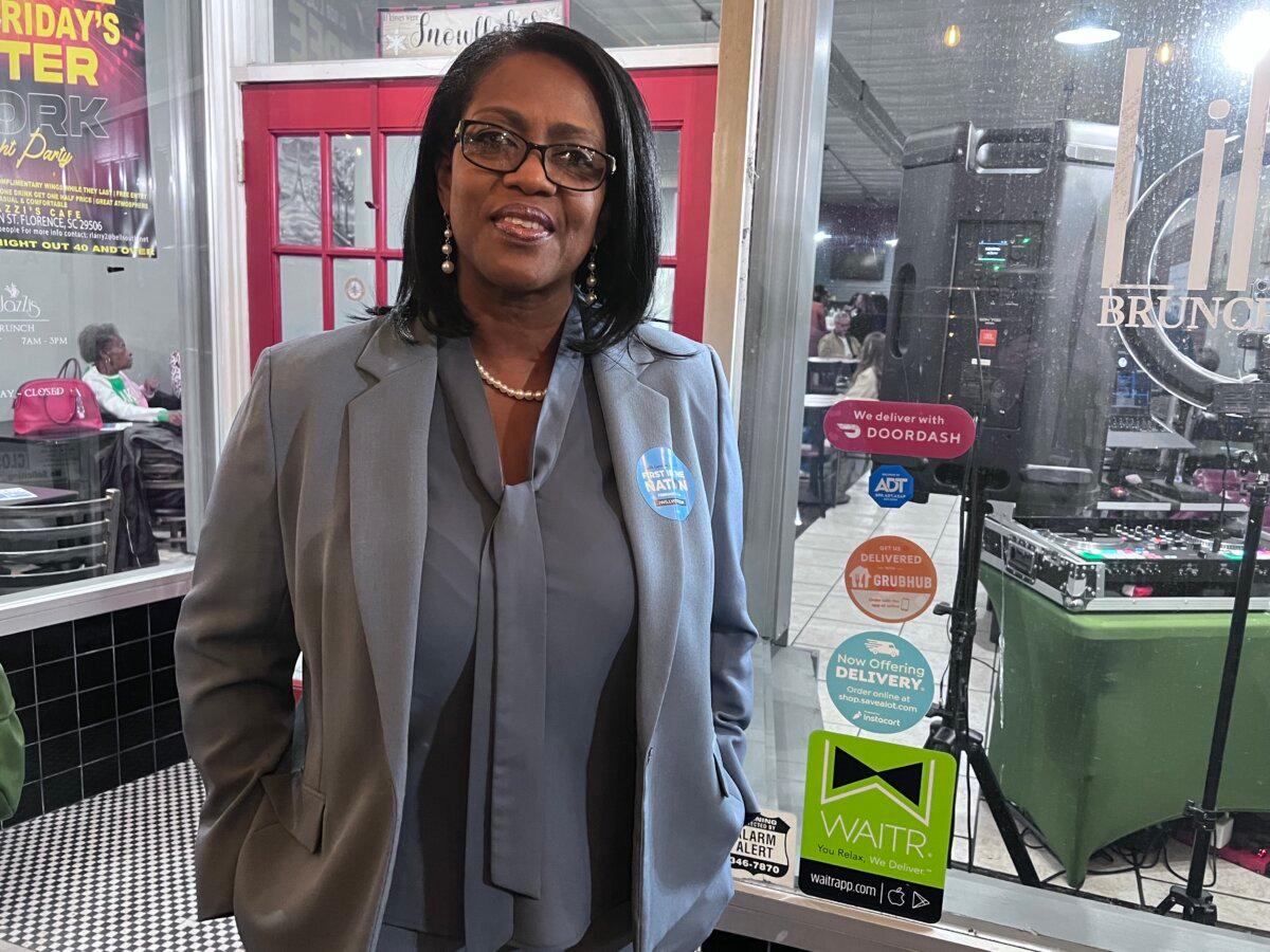 City Councilwoman Lenthonia Barnes stands outside LilJazZi's Cafe in Florence, S.C., on Feb. 1, 2024. (Lawrence Wilson/The Epoch Times)