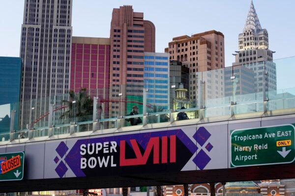 A sign for Super Bowl 58 adorns a pedestrian walkway across the Las Vegas Strip ahead of the NFL title game on Feb. 11. (John Locher/AP Photo)