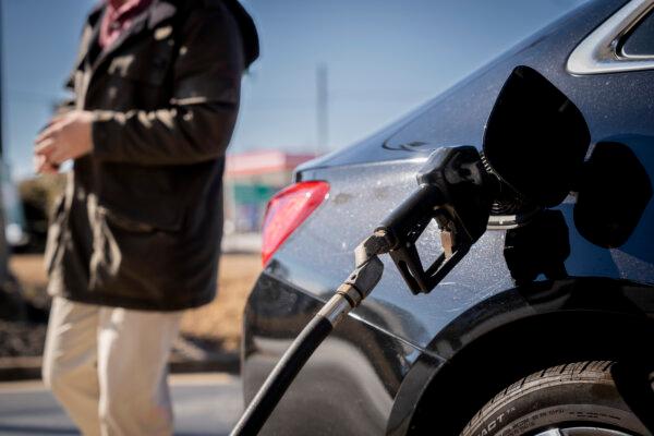 A person puts gas in his car at a gas station in Greenville, S.C., on Feb. 3, 2024. (Madalina Vasiliu/The Epoch Times)