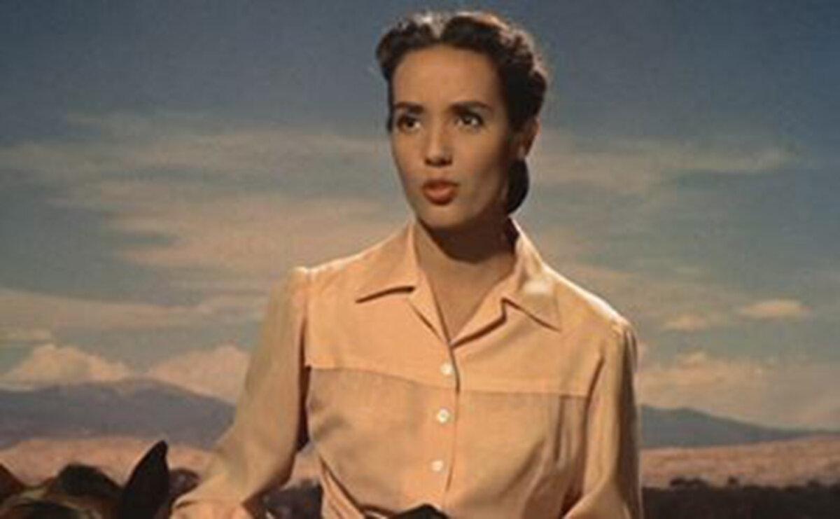 The lovely Anna Kashfi as Maria Vidal, in “Cowboy.” (Columbia Pictures)