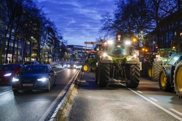 Farmers take part in a protest at the European district in Brussels on Feb. 1, 2024, calling for less red tape and protection from foreign competition and blocking roads around an EU summit. (Nicolas Maeterlinck/Belga/AFP via Getty Images)