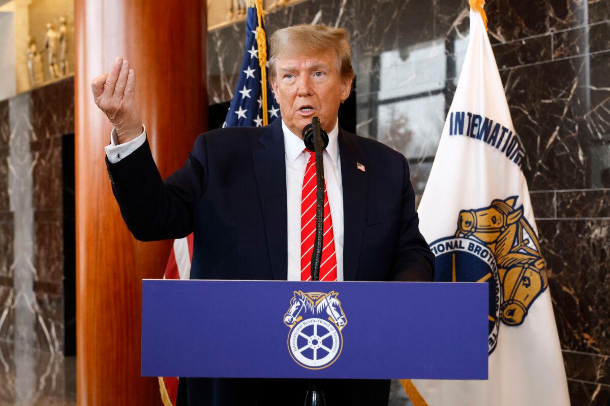 Republican presidential candidate and former President Donald Trump talks to reporters at the International Brotherhood of Teamsters headquarters in Washington on Jan. 31, 2024. (Chip Somodevilla/Getty Images)
