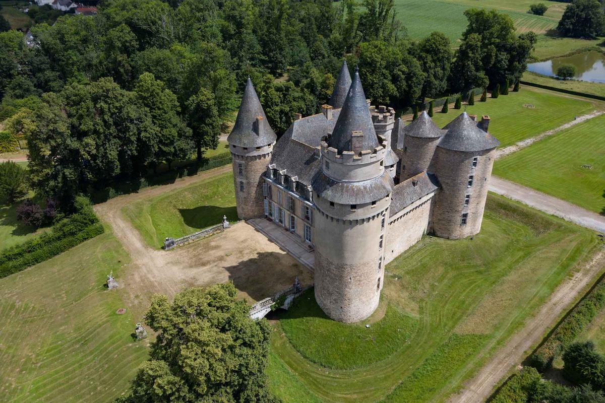 Aerial view of Château de Bonneval in the small village of Coussac-Bonneval, France. (Courtesy of Chris Brookes Photography)