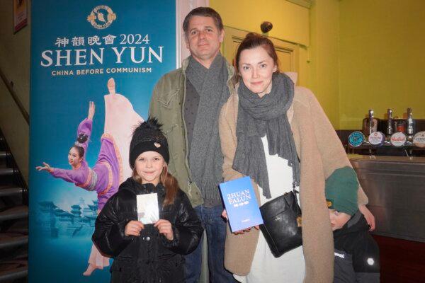 Angelika Zaczeniuk and her husband Kris Bandurski brought their children to a performance of Shen Yun Performing Arts at the Eventim Apollo in London on Feb. 4, 2024. (Mary Mann/The Epoch Times)
