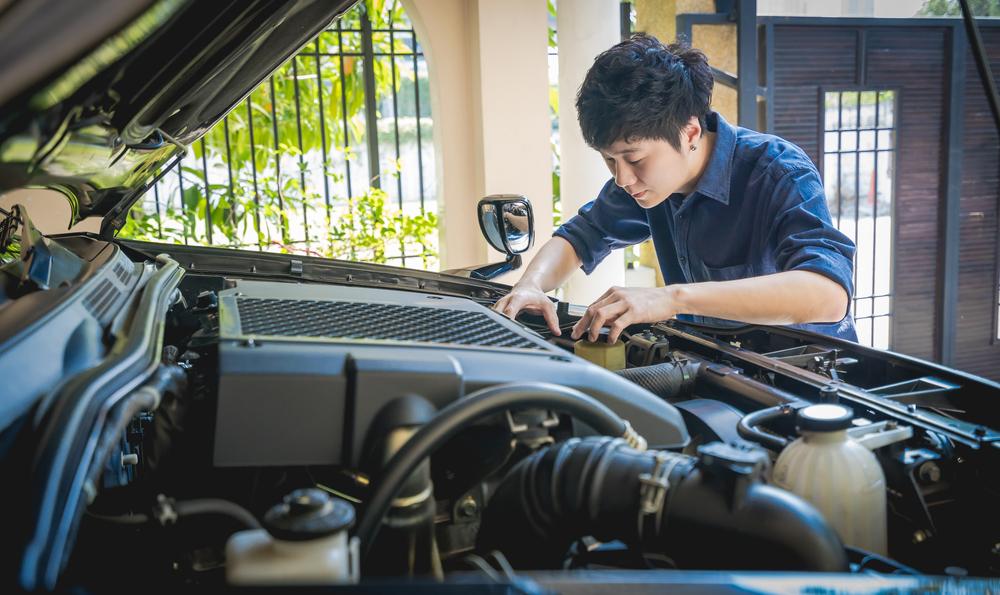 Since few people could afford to replace a broken car or appliance, skilled mechanics and repairmen were in demand. (Chill Chillz/Shutterstock)