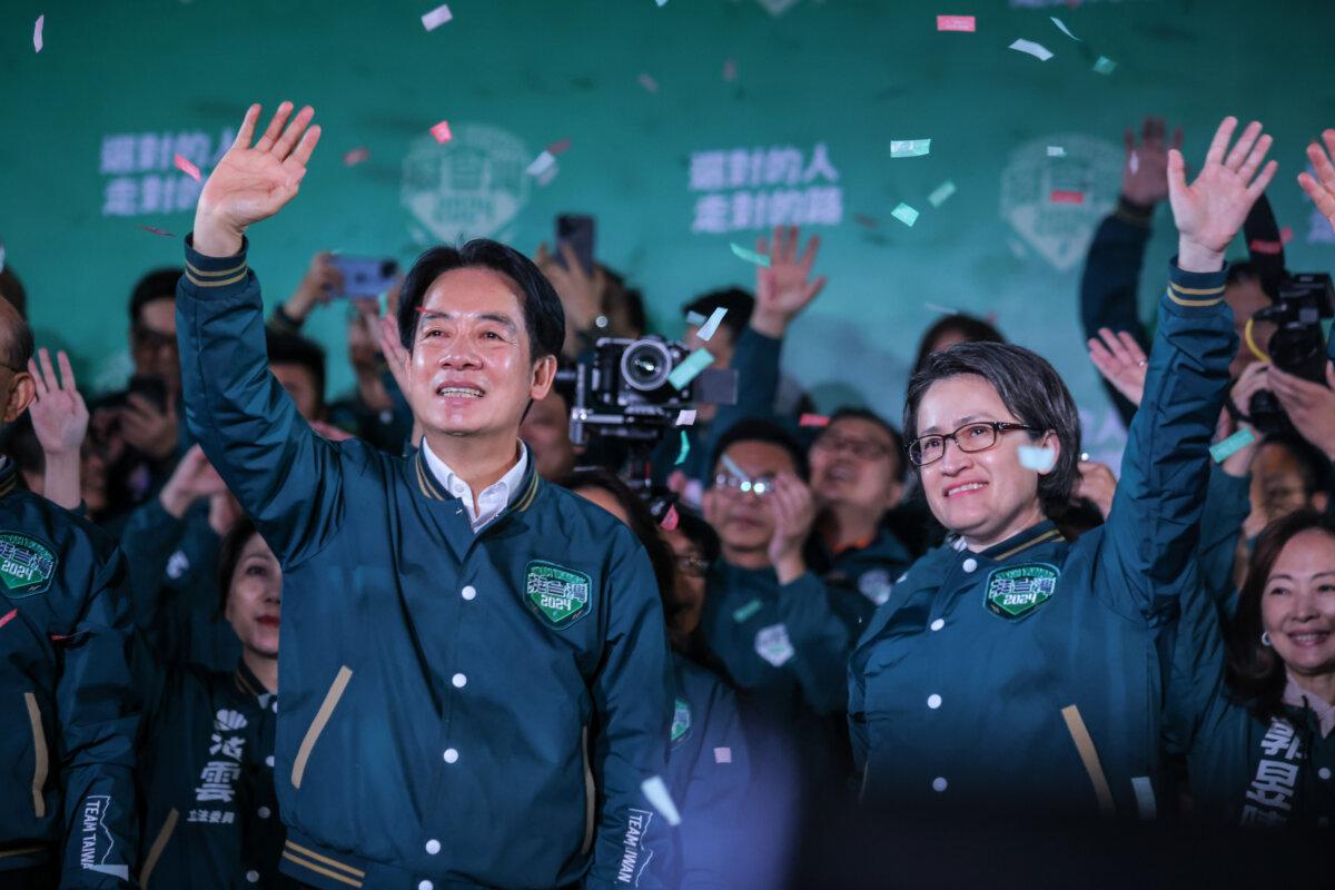 Confetti flies over the stage and crowd as Taiwan's president-elect Lai Ching-te (Center L), and his running mate Hsiao Bi-khim (Center R) speak to supporters at a rally at the party's headquarters in Taipei, Taiwan on Jan. 13, 2024. (Annabelle Chih/Getty Images)