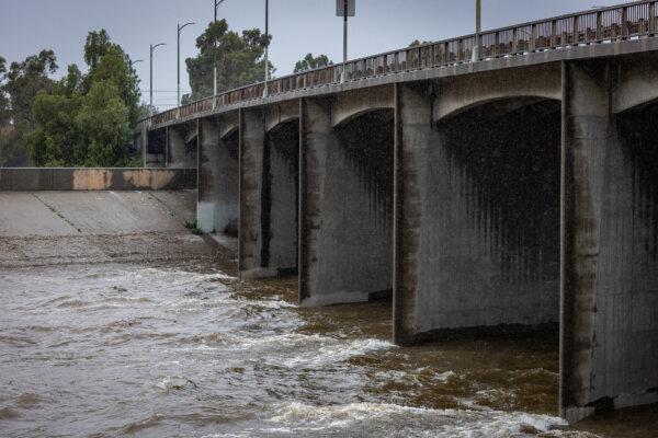 The Los Angeles River fills with rainwater after a recent storm in Long Beach, Calif., on Feb. 6, 2024. (John Fredricks/The Epoch Times)