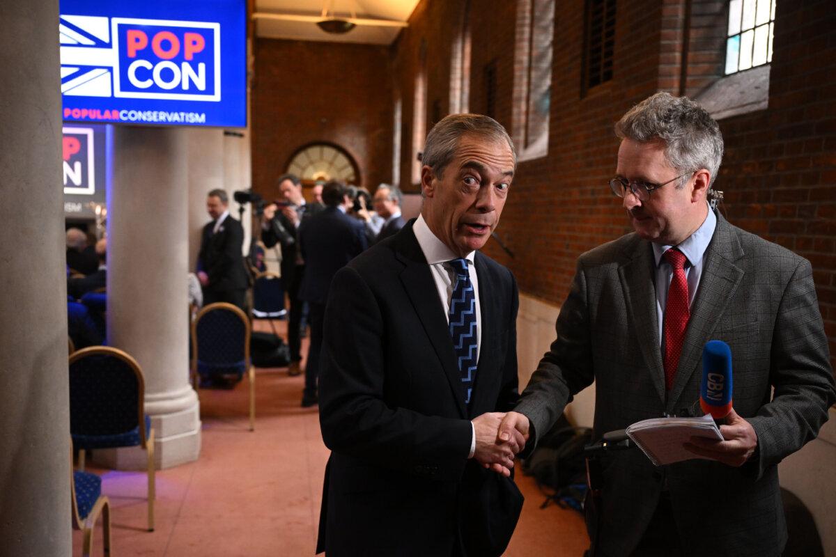 Nigel Farage (L) gives an interview at the Popular Conservatives conference in London on Feb. 6, 2024. (Leon Neal/Getty Images)