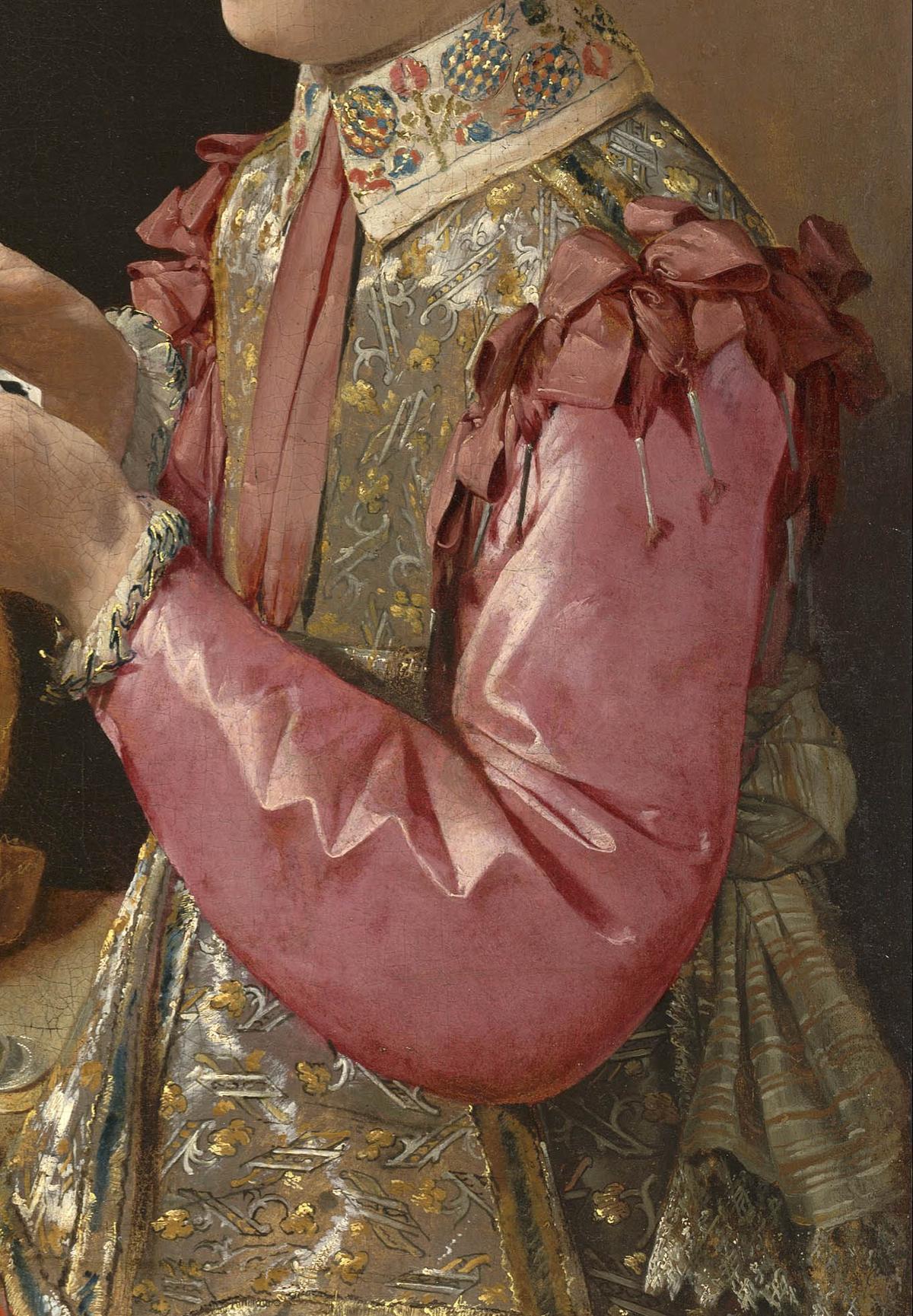 A detail of the dupe's collar and satin sleeves. (Public Domain)<span style="color: #ff0000;"> </span>