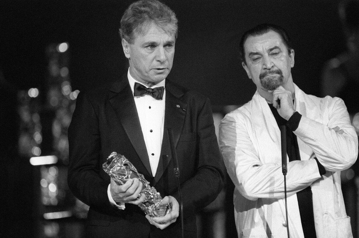 Film composer Maurice Jarre (L), receiving a César Award in honor of his career, stands beside French choreographer Maurice Béjart at the César ceremony in Paris on Feb. 22, 1986. Jarre, Oscar-winning composer for films including "Doctor Zhivago" and "Lawrence of Arabia," also wrote symphonic music and music for theater and ballet. (Pascal George/AFP via Getty Images)