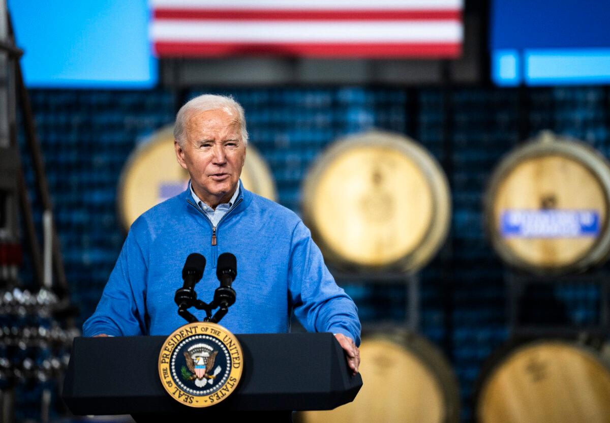 President Joe Biden speaks about funding for the I-535 Blatnik Bridge at Earth Rider Brewery in Superior, Wis., on Jan. 25, 2024. (Stephen Maturen/Getty Images)