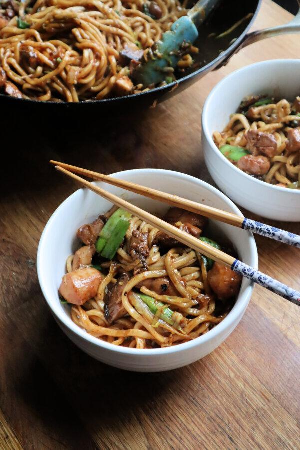 Stir-fried longevity noodles are never cut or broken by the cook. They're eaten in all corners of China during Chinese New Year to assure a long life. (Gretchen McKay/Pittsburgh Post-Gazette/TNS)