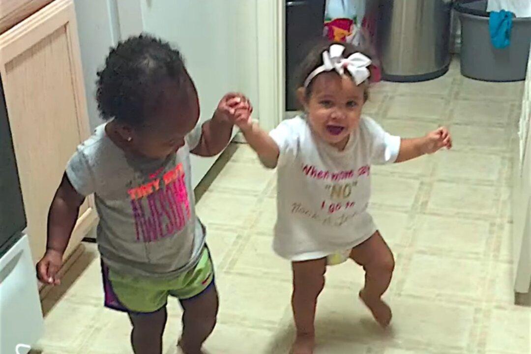 Toddler Helps Baby Cousin to Walk and Dance