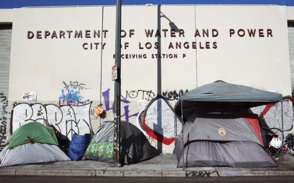 A homeless encampment stands in front of a city water and power building in the Skid Row community in Los Angeles on Sept. 28, 2023. (Mario Tama/Getty Images)
